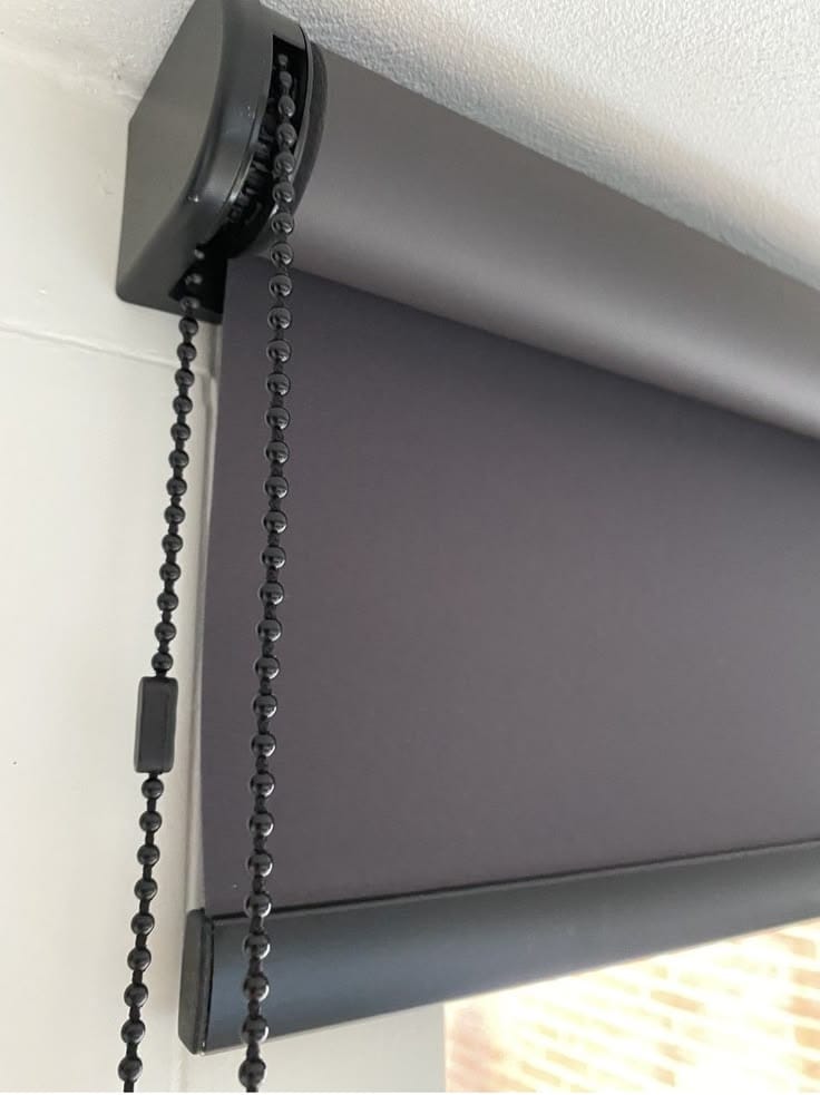 Blackout roller blind on an office window