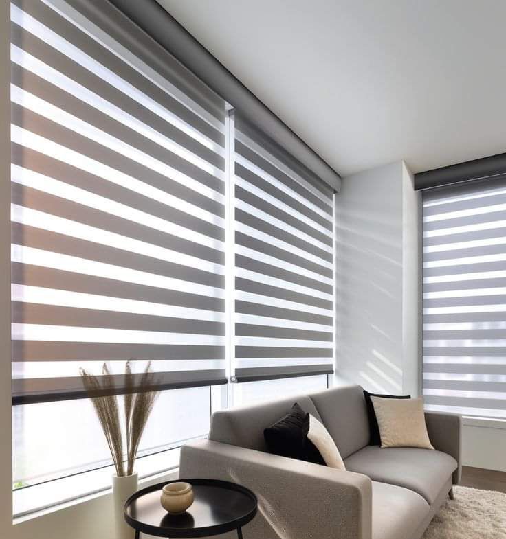 Grey zebra blind fitted in a living room