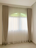 Sheer linen curtains with white voile in a Dubai home