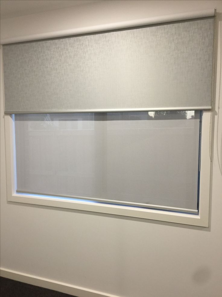 Roller blind fitted to a commercial window