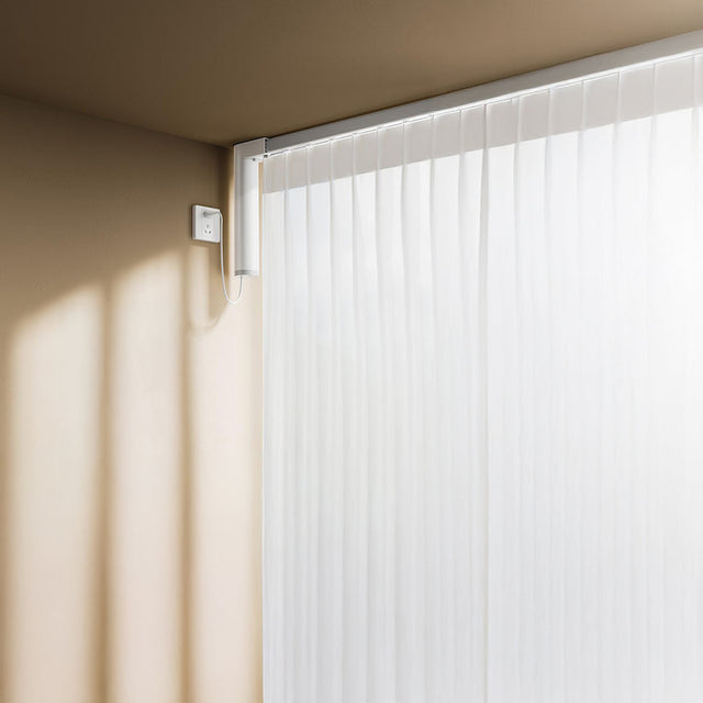 Motorised curtain track in a living room