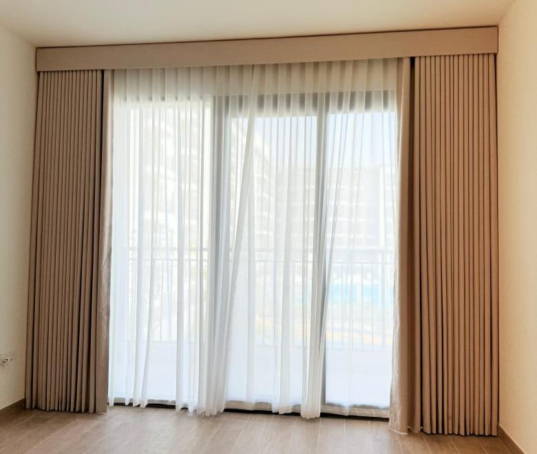 Sheer curtains with tie-backs in a living room